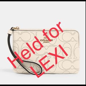 Do not buy. For Lexi. COACH Zip Wristlet In Signature Leather Chalk NWT